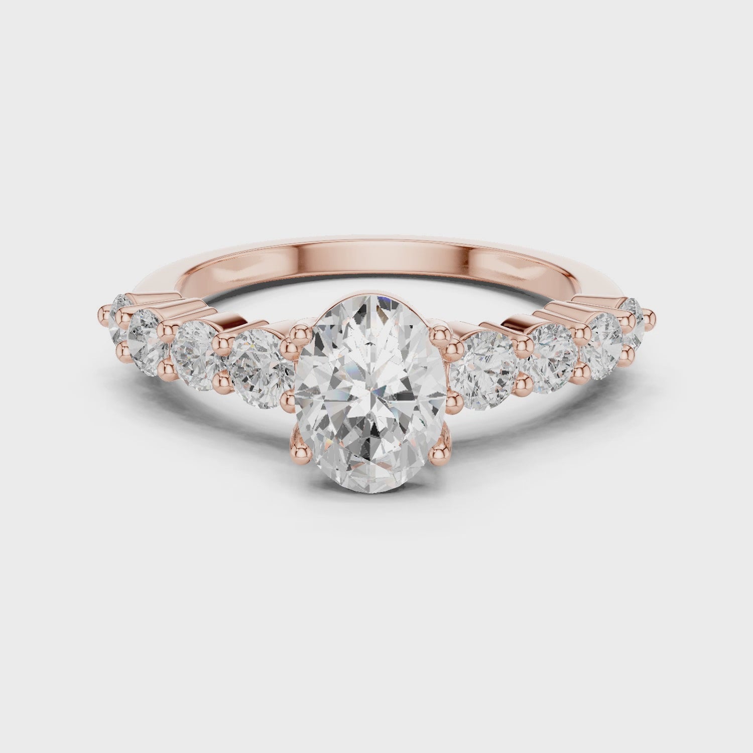 Oval-Cut Lab-grown Diamond Ring with Round Side Stones Oval-Cut Lab-grown Diamond Ring with Round Side Stones